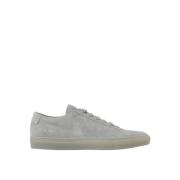 Grijze Suède Sneakers met Gouden Zijlogo Common Projects , Gray , Here...