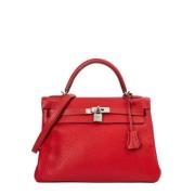 Pre-owned Leather handbags Hermès Vintage , Red , Dames