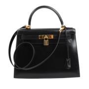 Pre-owned Leather handbags Hermès Vintage , Black , Dames