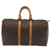 Pre-owned Canvas travel-bags Louis Vuitton Vintage , Brown , Dames