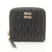 Pre-owned Leather wallets Miu Miu Pre-owned , Black , Dames