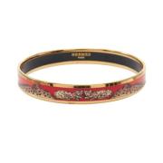 Pre-owned Metal bracelets Hermès Vintage , Yellow , Dames