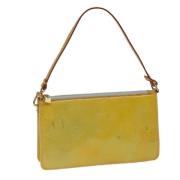 Pre-owned Leather pouches Louis Vuitton Vintage , Yellow , Dames