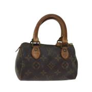 Pre-owned Canvas handbags Louis Vuitton Vintage , Brown , Dames