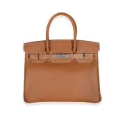 Pre-owned Leather handbags Hermès Vintage , Brown , Dames