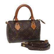 Pre-owned Canvas handbags Louis Vuitton Vintage , Brown , Dames