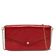 Pre-owned Leather clutches Louis Vuitton Vintage , Red , Dames