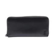 Pre-owned Leather wallets Yves Saint Laurent Vintage , Black , Dames