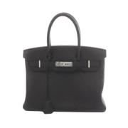 Pre-owned Leather handbags Hermès Vintage , Black , Dames