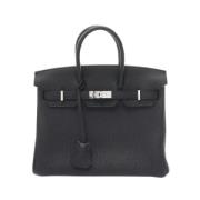 Pre-owned Leather handbags Hermès Vintage , Black , Dames