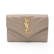 Pre-owned Leather wallets Yves Saint Laurent Vintage , Beige , Dames