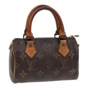 Pre-owned Canvas handbags Louis Vuitton Vintage , Brown , Dames