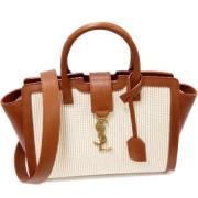 Pre-owned Leather handbags Yves Saint Laurent Vintage , Beige , Dames