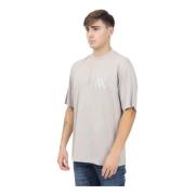 Beige T-shirt met korte mouwen en tonale logo borduursel Armani Exchan...