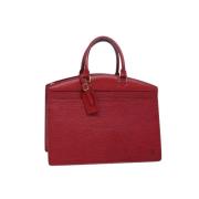 Pre-owned Leather handbags Louis Vuitton Vintage , Red , Dames