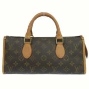 Pre-owned Fabric handbags Louis Vuitton Vintage , Brown , Dames