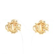 Pre-owned Metal earrings Dior Vintage , Yellow , Dames