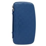 Pre-owned Leather clutches Louis Vuitton Vintage , Blue , Dames