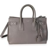 Pre-owned Leather handbags Yves Saint Laurent Vintage , Gray , Dames