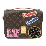 Pre-owned Canvas clutches Louis Vuitton Vintage , Brown , Dames