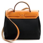 Pre-owned Leather handbags Hermès Vintage , Black , Dames