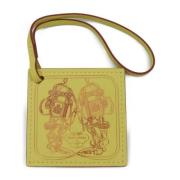 Pre-owned Fabric key-holders Hermès Vintage , Yellow , Dames