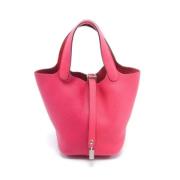 Pre-owned Leather handbags Hermès Vintage , Pink , Dames