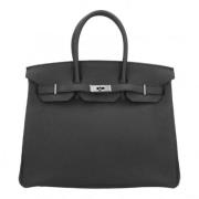 Pre-owned Leather handbags Hermès Vintage , Black , Dames