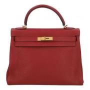 Pre-owned Leather handbags Hermès Vintage , Red , Dames