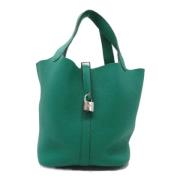 Pre-owned Leather handbags Hermès Vintage , Green , Dames