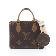 Pre-owned Canvas handbags Louis Vuitton Vintage , Beige , Dames