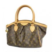 Pre-owned Fabric handbags Louis Vuitton Vintage , Brown , Dames