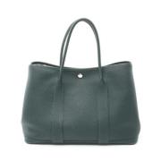 Pre-owned Leather handbags Hermès Vintage , Green , Dames