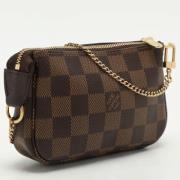 Pre-owned Canvas clutches Louis Vuitton Vintage , Brown , Dames