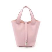 Pre-owned Leather handbags Hermès Vintage , Pink , Dames