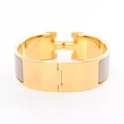 Pre-owned Metal bracelets Hermès Vintage , Yellow , Dames