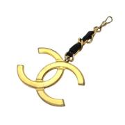 Pre-owned Metal key-holders Chanel Vintage , Yellow , Dames