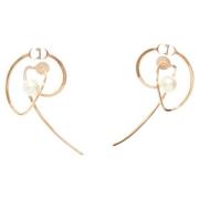 Pre-owned Metal earrings Dior Vintage , Yellow , Dames