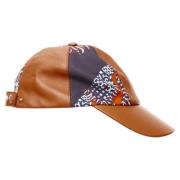 Pre-owned Leather hats Hermès Vintage , Brown , Dames