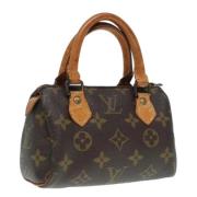 Pre-owned Canvas handbags Louis Vuitton Vintage , Brown , Dames