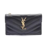 Pre-owned Leather wallets Yves Saint Laurent Vintage , Black , Dames