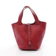 Pre-owned Leather handbags Hermès Vintage , Red , Dames