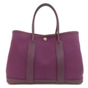 Pre-owned Canvas handbags Hermès Vintage , Purple , Dames