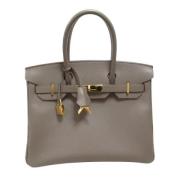 Pre-owned Leather handbags Hermès Vintage , Gray , Dames