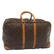 Pre-owned Canvas travel-bags Louis Vuitton Vintage , Brown , Dames