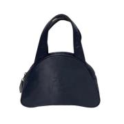 Pre-owned Canvas handbags Saint Laurent Vintage , Blue , Dames