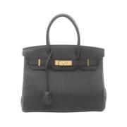 Pre-owned Leather handbags Hermès Vintage , Black , Dames