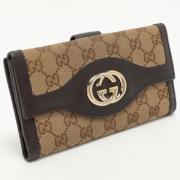 Pre-owned Canvas wallets Gucci Vintage , Beige , Dames