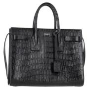 Pre-owned Leather handbags Yves Saint Laurent Vintage , Black , Dames