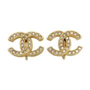 Pre-owned Metal earrings Chanel Vintage , Yellow , Dames